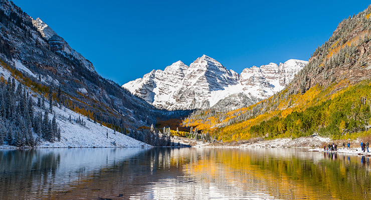 Mountain peak with lake reflection in foreground