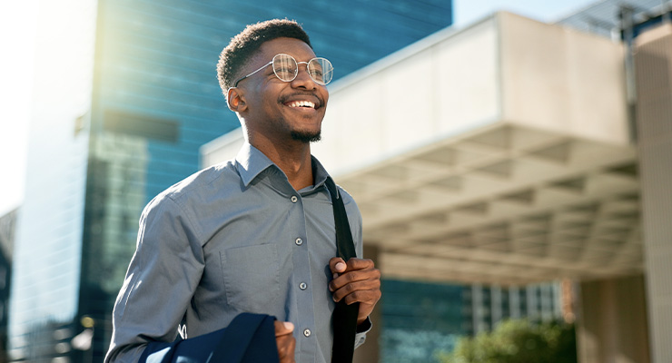 Man walking confidently in big city