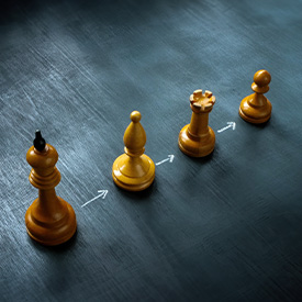 Row of chess pieces representing succession planning