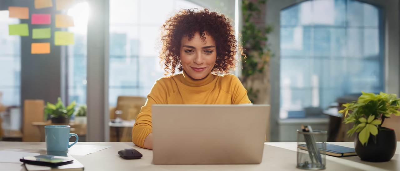 Inspiring young professional woman working in modern atmosphere